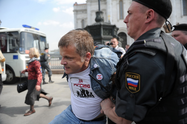 Pussy Riot supporters prevented from praying for Putin's resignation. (Image: Anton Belitskiy / Demotix)