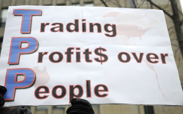 A sign saying "trading profits over people" during a rally to protest the proposed TPP trade agreement and NAFTA Agreement on January 31, 2014 in Toronto, Canada. (Photo: Shutterstock)