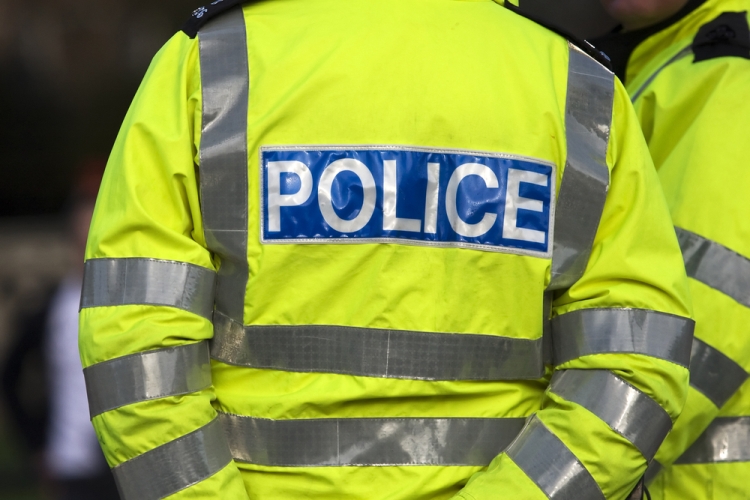 Police apologise for withholding name of charged officer