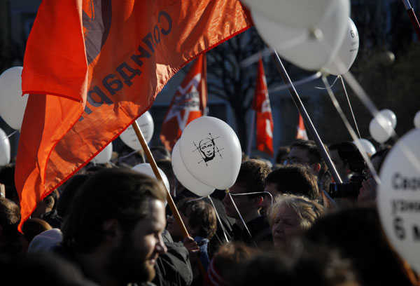 Russian opposition supporters gathered for a protest against Vladimir Putin and demanded the release of political prisoners. Photo: Elena Ignatyeva / Demotix