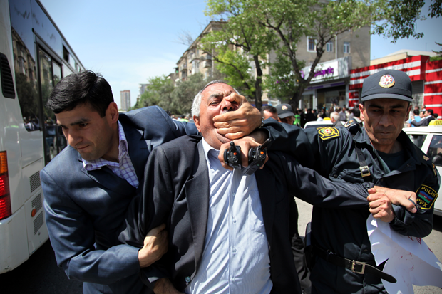 Narimanov Park, Baku, 15 May 2010. Police forcibly detain a political activist during an unsanctioned protest. Photograph by Abbas Atilay