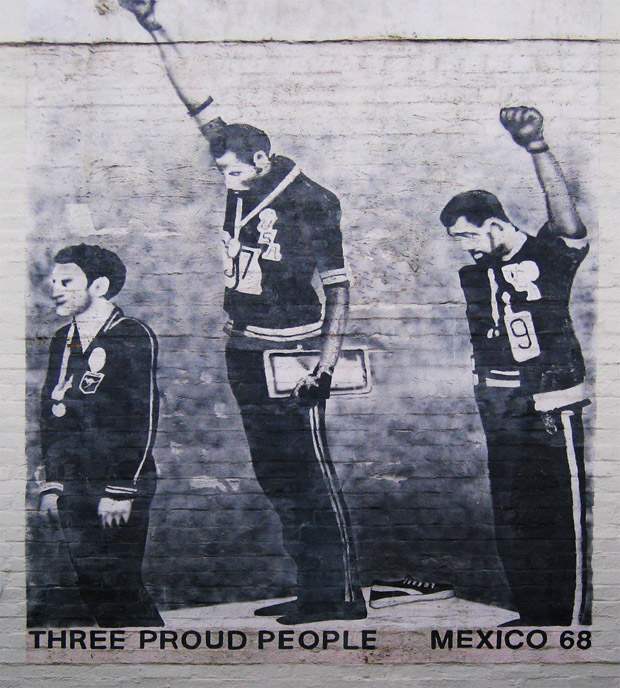 Tommie Smith, John Carlos and Peter Norman showing solidarity for the civil rights movement at the Mexico City Olympics in 1968 (Image: Newtown graffiti/Wikimedia Commons)