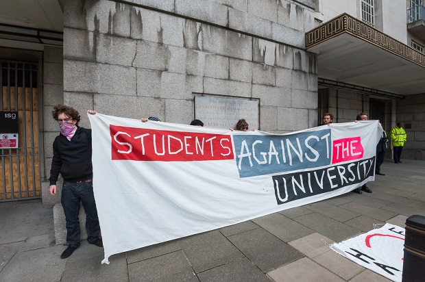 Students defy the protest ban imposed by the University of London to speak out against the privatisation of university support services. (Photo: Peter Marshall/Demotix) 