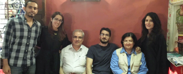 Ebrahim Sharif received a royal pardon before being rearrested three weeks later. He was photographed with his family during his brief release.