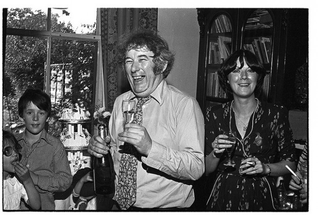 Seamus Heaney with his family and at a party at home in Dublin, 1979. Bobbie Hanvey, photographer.