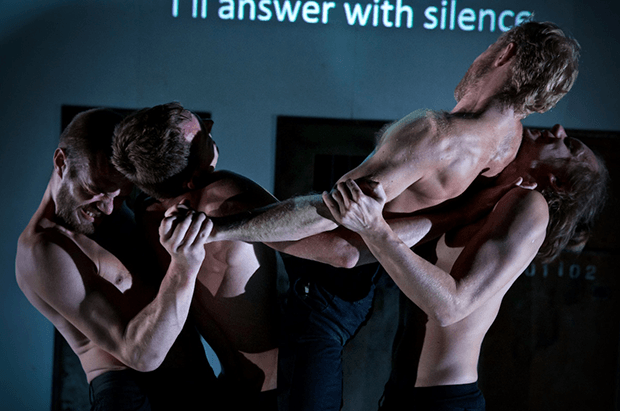 Kiryl Kanstantsinau, Siarhei Kvachonak, Andrei Urazau and Pavel Haradnitski performing in Burning Doors. (Photo by Nicolai Khalezin for Belarus Free Theatre)