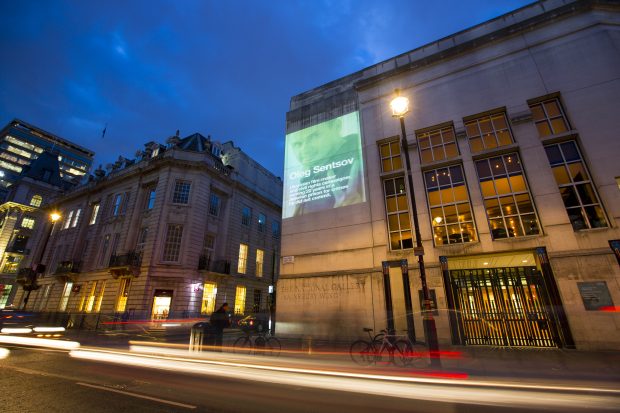 OCT 2016: LONDON: Belarus Free Theatre project Ai Weiwei's symbol of freedom of expression onto five iconic buildings across London (10 Oct 2016) to highlight the case of Oleg Sentsov, the popular film director and pro-Ukrainian activist serving a 20-year prison sentence in Russia for a crime he did not commit. ( Pictures by Graeme Robertson )