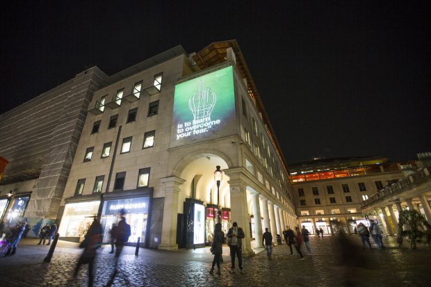 OCT 2016: LONDON: Belarus Free Theatre project Ai Weiwei's symbol of freedom of expression onto five iconic buildings across London (10 Oct 2016) to highlight the case of Oleg Sentsov, the popular film director and pro-Ukrainian activist serving a 20-year prison sentence in Russia for a crime he did not commit. ( Pictures by Graeme Robertson )