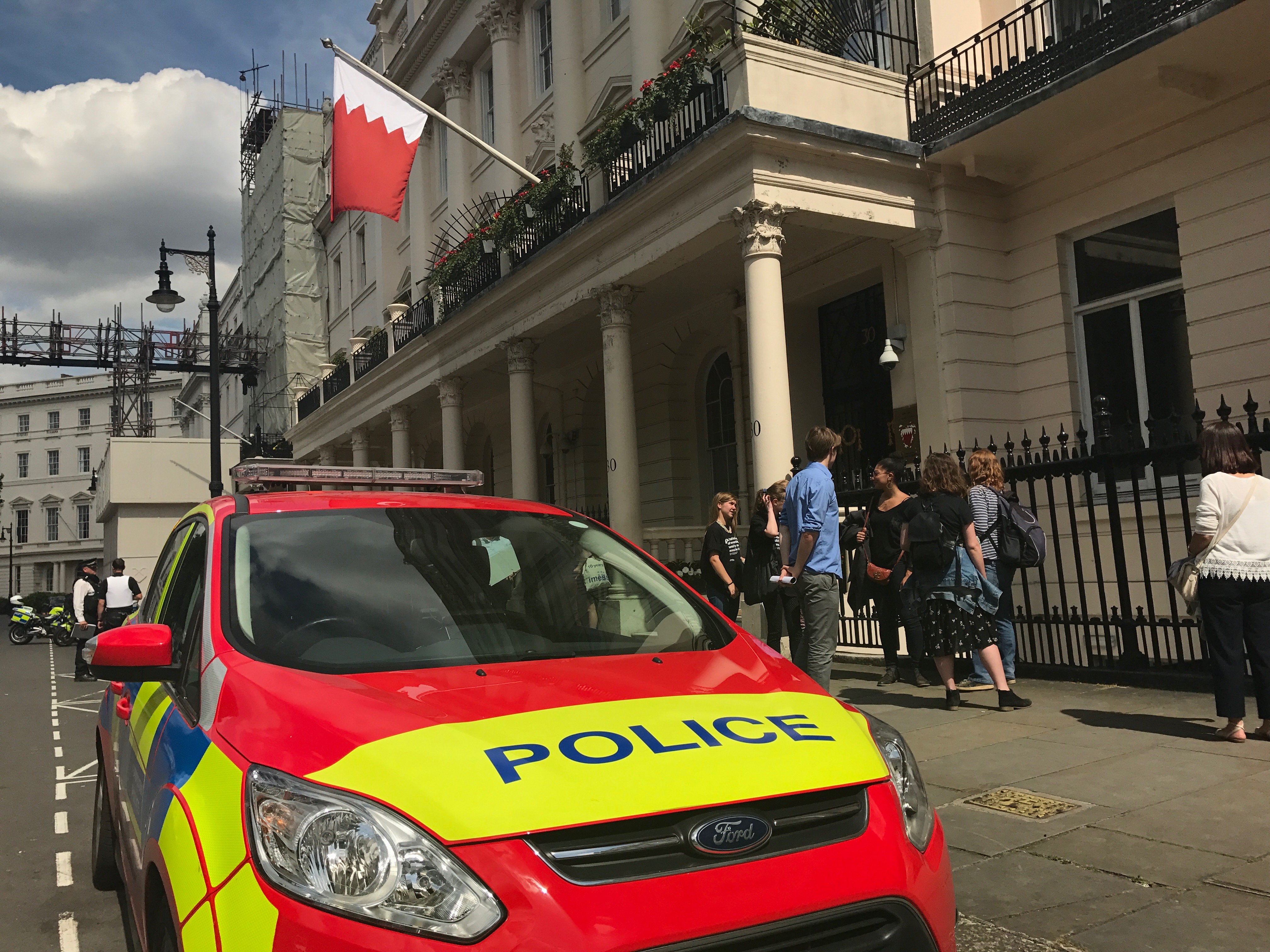 Police cars arrived outside the Embassy of Bahrain during protest and later arrested a protester, Sayed Ahmed Alwadaei.