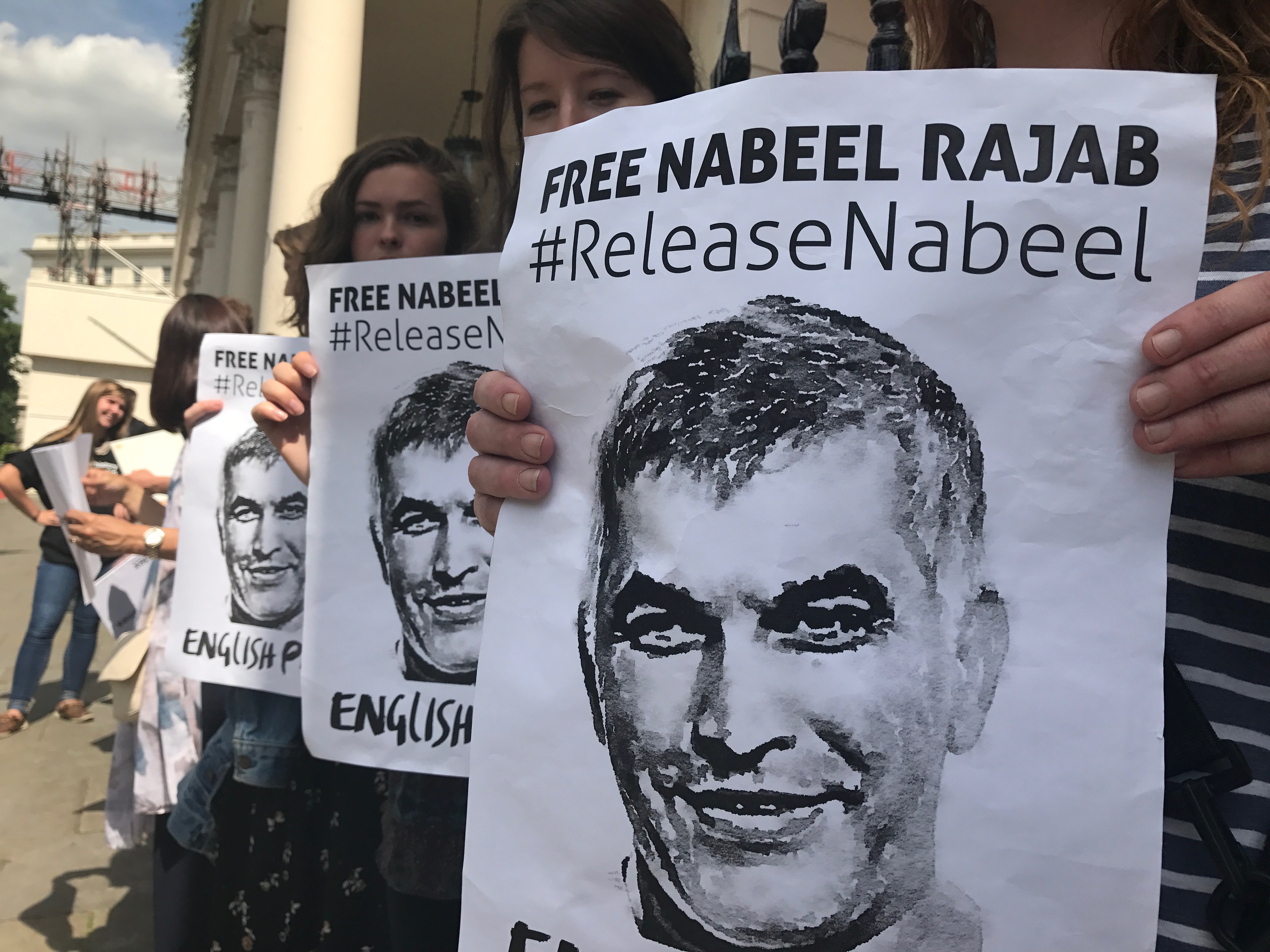 Protesters stand outside Bahrain embassy in London showing their solidarity to free Nabeel Rajab.