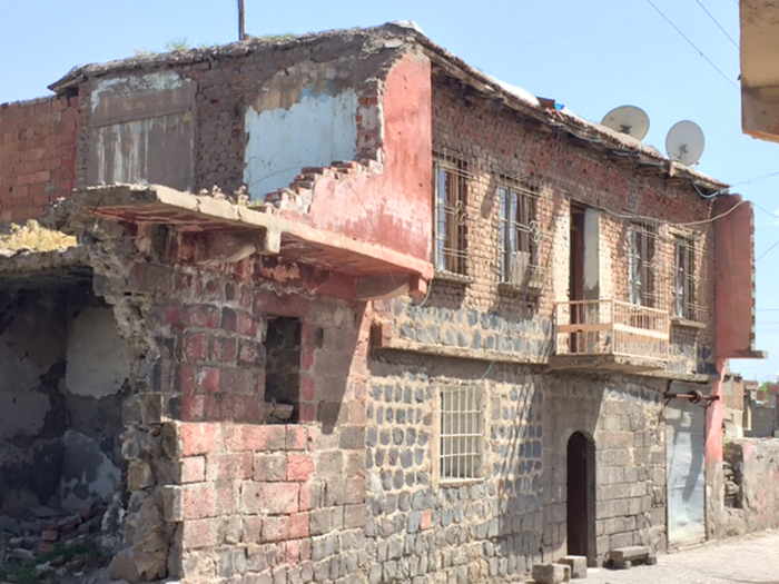 Historic buildings were destroyed in order to build housing for the displaced and the area quickly became a slum. In a short time, some of the new housing became unhealthy and unstable.