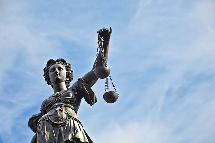 Statue of Lady Justice in front of the Romer in Frankfurt - Germany