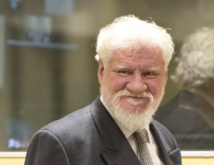 Journalists who referred to Slobodan Praljak, seen here in 2013, and his co-defendants as war criminals after their conviction have been targeted by parties who think the men are heroes. (Photo: UN International Criminal Tribunal for the former Yugoslavia)