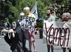 Members of the Catholic Worker movement take part in a vigil in Union Square Park, New York, for the people of Yemen, Felton Davis/Flickr