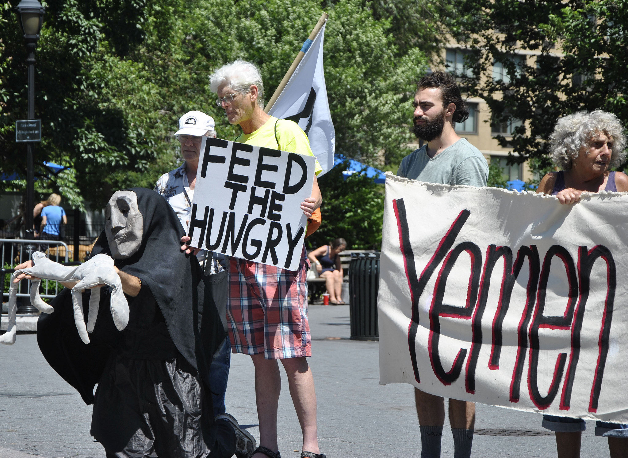Members of the Catholic Worker movement take part in a vigil in Union Square Park, New York, for the people of Yemen, Felton Davis/Flickr