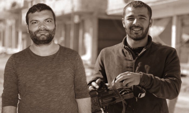Dihaber reporters Erdoğan Alayumat (L) and Nuri Akman face up to 45 years in prison on terror and espionage charges.