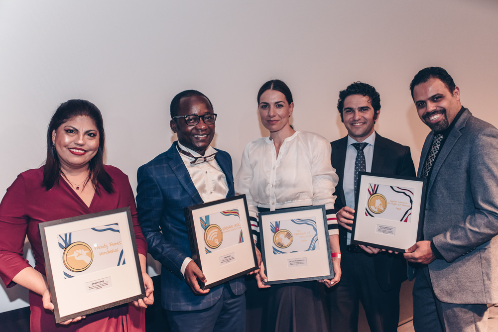 2018 Freedom of Expression Journalism Award-winner and 2018 Journalism Fellow Honduran investigative journalist Wendy Funes; 2018 Digital Activism Fellow Guy Muyembe of the Digital Activism Award-winning Habari RDC; CEO of the Serpentine Galleries Yana Peel holding the 2018 Arts Award on behalf of Cuba's Museo de la Disidencia, who were unable to attend; Mohamed Sameh and Ahmad Abdallah of the 2018 Campaigning Award-winning Egyptian Commission for Rights and Freedoms at the 2018 Index on Censorship Freedom of Expression Awards (Photo: Elina Kansikas for Index on Censorship)