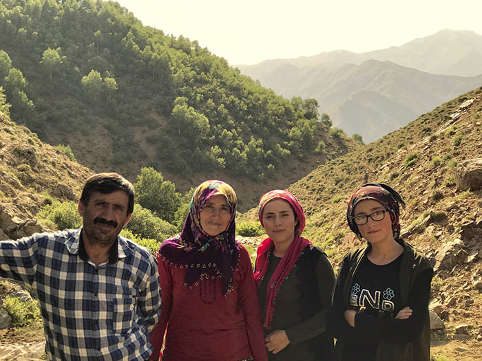 İdris Sayılgan’s father Ramazan, mother Sebiha and sisters Tuğba and İrem pose in the meadow where the family comes the summers to breed their cattle (Credit: Mezopotamya Agency)