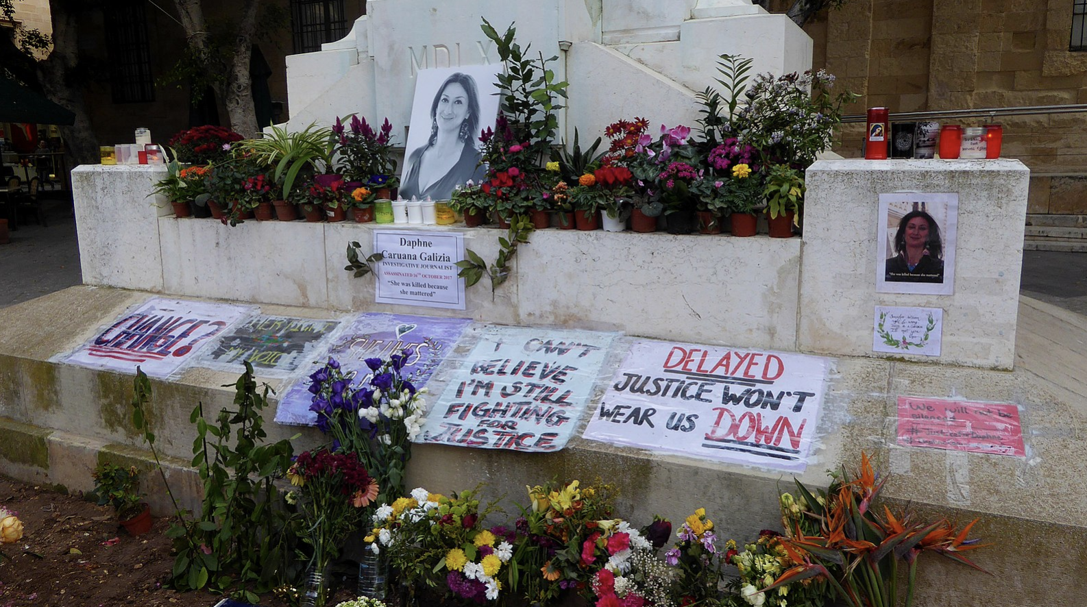 Memorial to murdered investigative journalist Daphne Caruana Galizia at the foot of the Great Siege Monument in Valletta, Malta