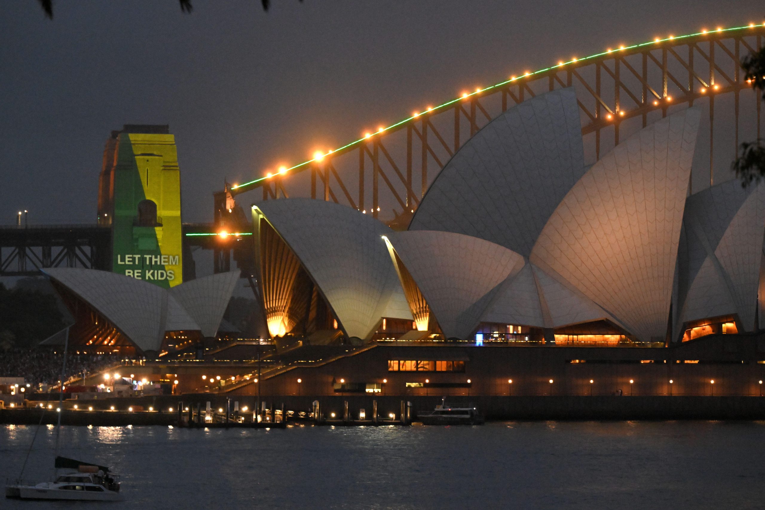 Sydney, Australia. 10th Dec, 2025. The social media ban for children under 16 slogan ?Let Them Be Kids? is seen projected on the pylons of the Sydney Harbour Bridge in Sydney, Wednesday, December 10, 2025. (AAP Image/Mick Tsikas) NO ARCHIVING Credit: Aust The social media ban for children under 16 slogan “Let Them Be Kids” is seen projected on the pylons of the Sydney Harbour Bridge in Sydney
